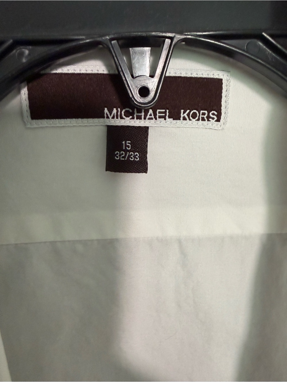 Michael Kors White Men’s or Women’s Dress shirt with long sleeves.